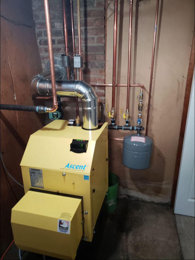 Energy Kinetics Ascent Combi boiler installed in a Long Island basement