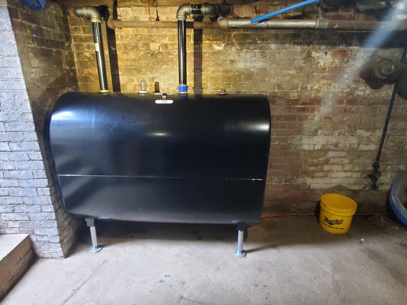 New Granby steel oil tank installed in the same cellar with new fill and vent piping